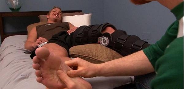  Injured gay jock gets more than a foot rub